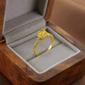 Sunlight Yellow Crystal Solitaire Ring – Gold Halo Band
