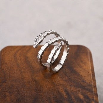 Double Snake Coil Ring – Gold and silver Wrap Design with CZ Eyes